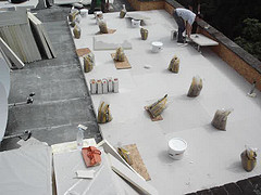 a flat roof repair service in Kirkdale